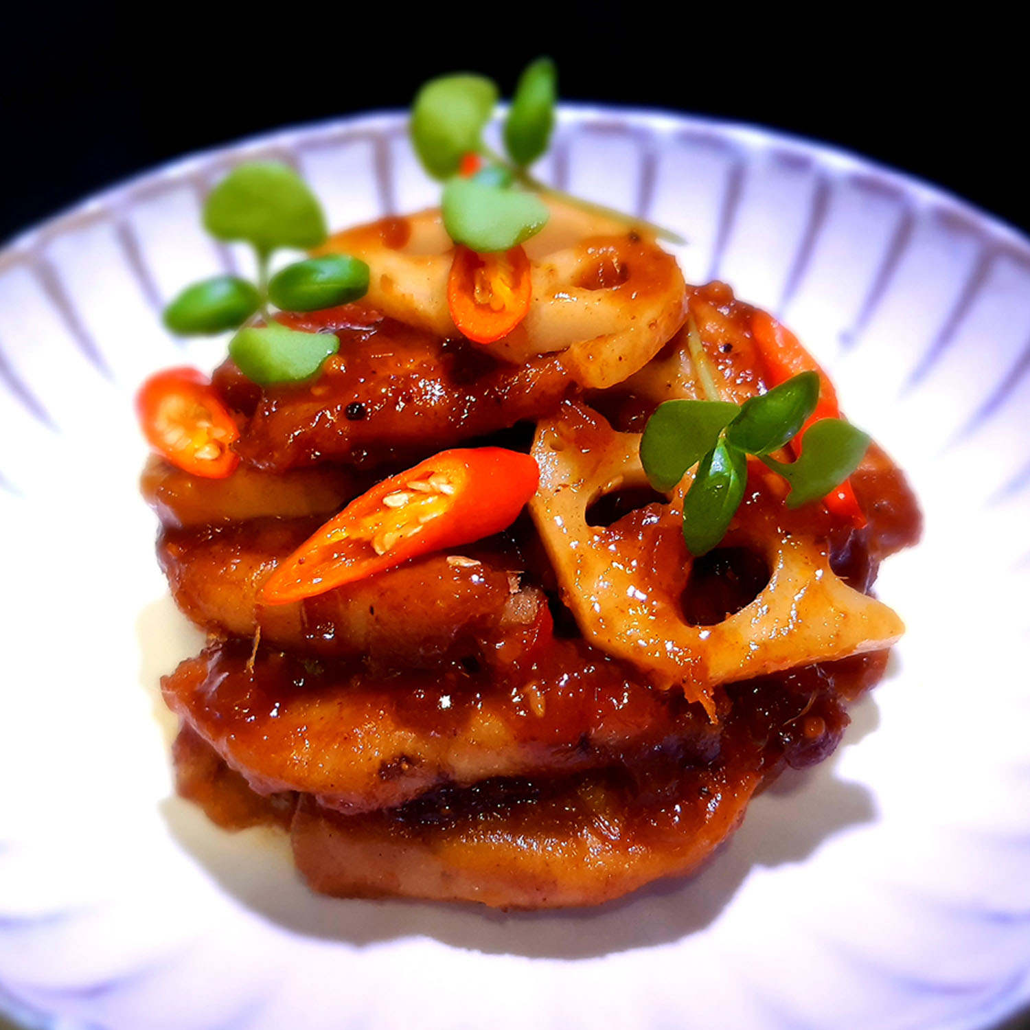 Stir-fried plant based chicken tenders, with black pepper sauce