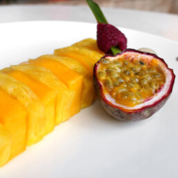 Plate of fruit, mango with pineapple